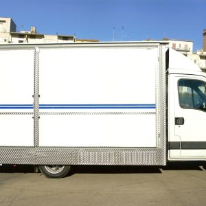 Autonegozio per Merceria con sponda posteriore caricatrice di carrelli